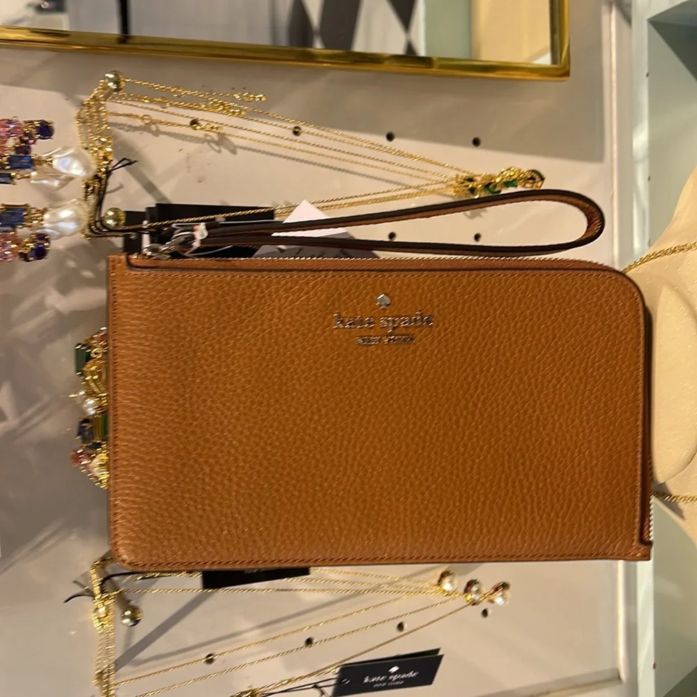 Kate Spade Medium Lucy L-Zip Wristlet Pebble Leather 

Warm Gingerbread 
NWT - Picture 15 of 16